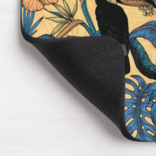 Toucan-tuin in geel en blauw muismat (Hoek)