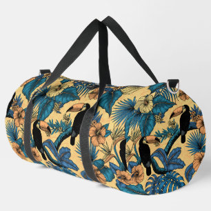 Toucan-tuin in geel en blauw plunjezak