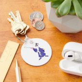 Tovenaar die een Magische Sleutelhanger van de Spe