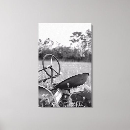 Tractor in Grass Black en White Canvas Print (Voorkant)