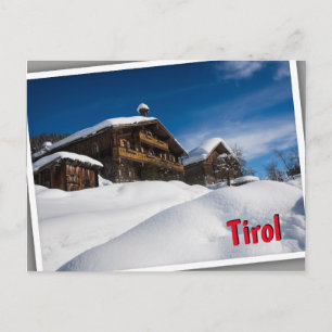Traditionele houten kasten in de sneeuw in Tirol Briefkaart