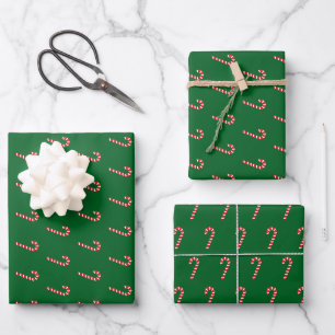 Traditionele snoepstok & groen inpakpapier vel