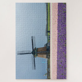 Traditionele windmolen met roze en paarse bloemen legpuzzel