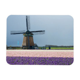 Traditionele windmolen met roze en paarse bloemen magneet
