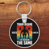 Train krankzinnigen of blijf dezelfde fitnessruimt sleutelhanger (Voorkant)