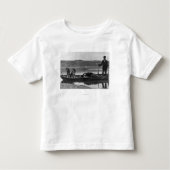 Trapper in Canoe met Hides en Dogs Alaska Kinder Shirts (Voorkant)