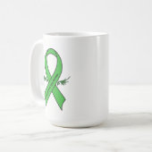 Traumatisch hersenletsellint met vleugels koffiemok (Voorkant links)