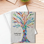 Tree of Life Rainbow Colours Custom Planner<br><div class="desc">Deze bijzondere Planner is versierd met een regenboogkleurige Tree of Life mozaïek op een bleke grijze achtergrond. Het oorspronkelijke ontwerp werd gemaakt met behulp van kleine stukjes helder gekleurd glas. Pas het aan met jouw naam en jaar. Origineel mozaïek © Michele Davies.</div>