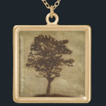 Tree Silhouette on Bronze Background Goud Vergulden Ketting<br><div class="desc">A bronze background serves as the scene for this silhouette of a tree with branches swaying in the breeze. You almost feel as if you could rest your back against this tree,  sit on the ground and take a long nap.</div>