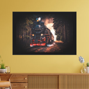 Trein met motor die door een weelderig bosgebied d canvas afdruk