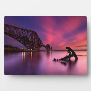 Treinbrug over de voorgrond op zonsondergang Sch Fotoplaat
