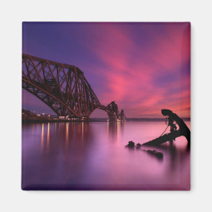 Treinbrug over de voorgrond op zonsondergang Sch Magneet