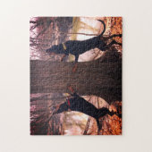 Treing Black & Tan Coonhounds op de rivier Legpuzzel (Verticaal)