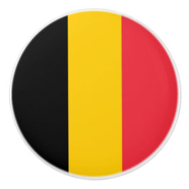Trek van de keramische knop met vlag van België