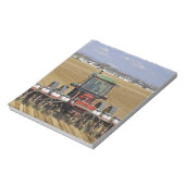 Trekker die een zaadmaïsplanter trekt. notitieblok (Linkerzijde)