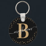 Trendy Girly Black Gold Name Script Monogramed Sleutelhanger<br><div class="desc">Meisjes, elegant, trendy, modern, zwart en goud, monogram initiaal naam script aangepast aan gepersonaliseerde monogrammed sleutelhanger. Met een monogram initiaal en een girale naam script in een handgeschreven kalligrafie spoelt het staartlettertype en een gestippeld cirkelvormig lijst rond uw monogram. Perfect vrouwelijk geschenk voor zus, moeder, vriendin, verjaardag, bruiloft, vrijgezellenfeest, zoete...</div>