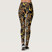 Trendy Inspirerende Zwarte Gele Geborstelde Script Leggings (Achterkant)