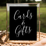 Trendy Script Black Wedding Cards and Gifts Sign Poster<br><div class="desc">Dit eenvoudige en elegante trouwbord heeft de uitdrukking "Kaarten en geschenken" in wit schrift op een opvallende zwarte achtergrond en biedt een verfijnde touch aan uw evenement. Personaliseer het bord met optionele aangepaste tekst, zoals uw namen, trouwdatum of een oprecht bedankbericht, om het echt uniek te maken. Perfect voor bruiloften,...</div>