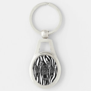 Trendy zebra kudde op zebraprint sleutelhanger