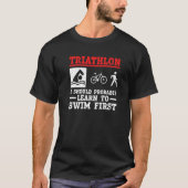 Triathlon moet ik waarschijnlijk eerst leren zwemm t-shirt (Voorkant)