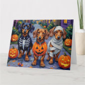 Trick-or-Treating honden tijdens Halloween Kaart (Voorkant)