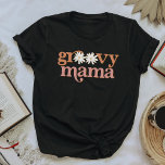 TRIXIE Retro Pink Oranje Daisy Groovy Mama T-shirt<br><div class="desc">Dit t shirt is voorzien van een retro-bosmische lettersoort met leuke heldere oranje en roze kleuren en dessins. Dit mama shirt is het perfecte geschenk voor je favoriete moeder of werkt als een geweldig 70-jarig idee van zwangerschapsaankondiging.</div>