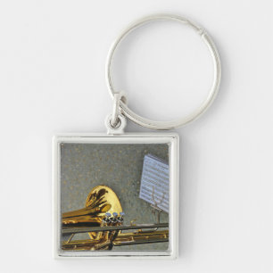 Trombone-muziekinstrument met notatie sleutelhanger