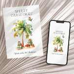 Tropical Christmas Flat Holiday Kaart<br><div class="desc">Verander de traditionele kerstsfeer met onze tropische kerstkaart. Ideaal voor degenen die festiviteiten onder de zon vieren, het beschikt over een levendige palmboom versierd met gekleurde kerstballen, geschenken verspreid langs het zandstrand, terwijl een speelse papegaai met een kerstmuts in de scène stoomt. Voor degenen die het geluk hebben om de...</div>