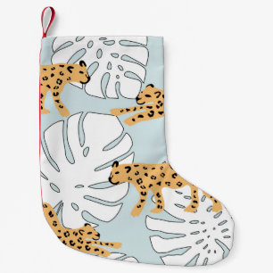Tropical leopard animal and monstera palm leaves,  kleine kerstsok