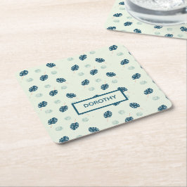 Tropisch monstera laat monogram op blauw kartonnen onderzetters