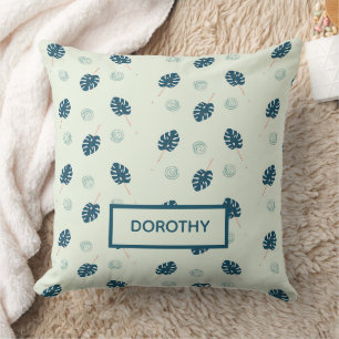 Tropisch monstera laat monogram op blauw kussen