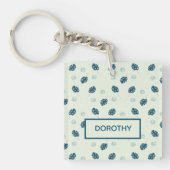 Tropisch monstera laat monogram op blauw sleutelhanger (voorkant)