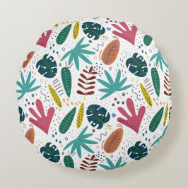 Tropisch patroon met kleurrijke bladeren rond kussen