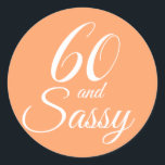 Tropisch Sinaasappel 60 Sassy 60th Birthday Ronde Sticker<br><div class="desc">Viel om 60 in stijl met dit tropische 60ste verjaardagsontwerp in het papaya sinaasappel. De woorden 60 en de assy in wit worden geplaatst gebruikend modern manuscript en typografie. De gelijkaardige producten zoals uitnodigingen en partijlevering en giften zijn beschikbaar in onze winkel. Als je hulp nodig hebt, kun je contact...</div>