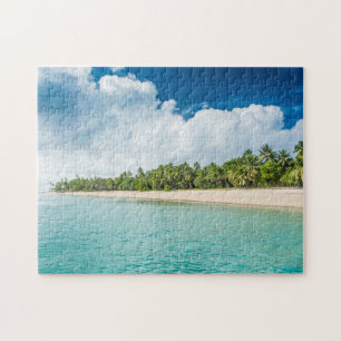 Tropisch strand omzoomd door palmen legpuzzel