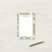 Tropische bladeren en gouden persoonlijke artikele post-it® notes (Op bureau)