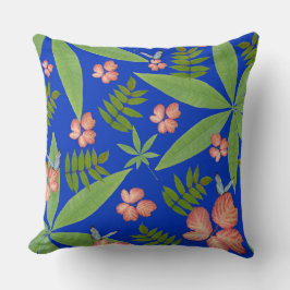 Tropische bladeren op blauw kussen