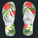 Tropische Bloemen Mevrouw Bride ID475 Teenslippers<br><div class="desc">Creëer Special Flipflops voor de bruid met dit prachtige ontwerp met weelderig tropisch gebladerte en kleurrijke bloemenaccenten. De opvallende scripttekst 'mrs' is optioneel en kan worden verwijderd om de sjabloon voor andere gelegenheden te gebruiken. Zoek ID475 om andere producten met dit ontwerp te bekijken,  waaronder bijpassende huwelijksbriefpapier en meer.</div>