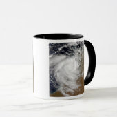 Tropische cycloon Magda die aan land komt in Ooste Mok (Voorkant rechts)