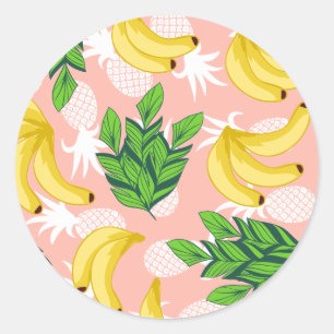 Tropische gele bananen en ananassen op roze ronde sticker