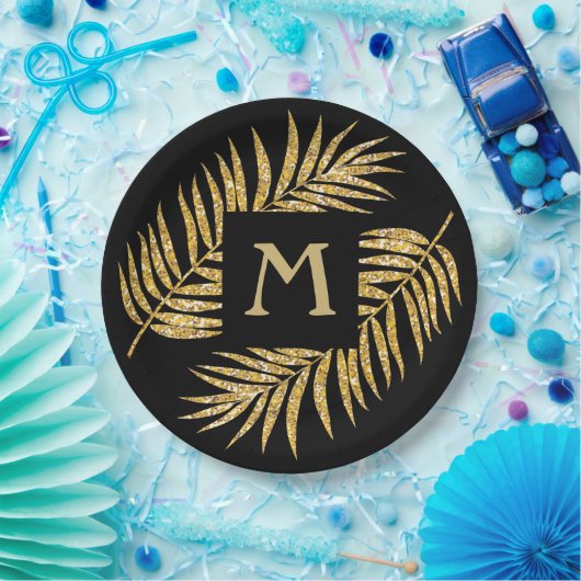 Tropische goudpalmhulzen aan zwarte zijden papieren bordje (Feest)
