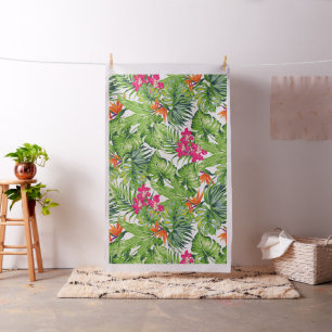 Tropische groene bladeren en roze bloemen stof