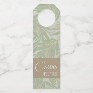 Tropische groene en gouden bladeren op pagina's flessenhanger