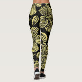 Tropische hibiscus: zwart-gele  bloemen. leggings (Achterkant)