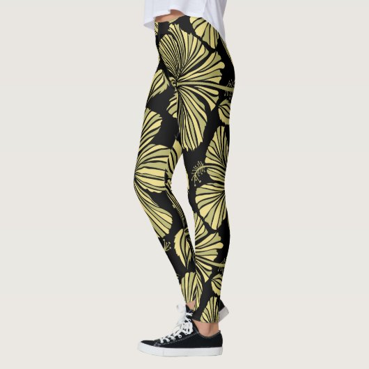 Tropische hibiscus: zwart-gele  bloemen. leggings (Links)