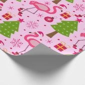 Tropische kerst flamingo met dennenboom op roze cadeaupapier (Hoek)