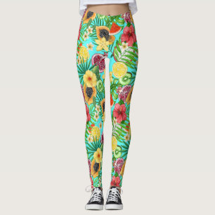 Tropische mix-fruit, bloemen en bladeren op blauw leggings