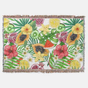 Tropische mix-fruit, bloemen en bladeren op wit deken