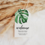 Tropische Palm Greenery Welcome Note Labels Cadeaulabel<br><div class="desc">Mooie waterverf van tropische palmbladeren met een welkomstteken met een dankjewel met uw namen, locatie en datum op de achterkant, kan worden gebruikt voor huwelijksgunsten, feestbevoordelingen, douchebevoordelingen, welkomstzakken of tafeldecor. Gift labels zijn perfect voor een bruiloft, strandfeest, zomerfeest, cadeau voor de waardering van leraren, vrijgezellenfeest, baby shower en nog veel...</div>