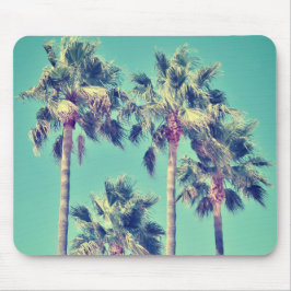 Tropische  palmbomen met een Blauwgroen hemel Muismat